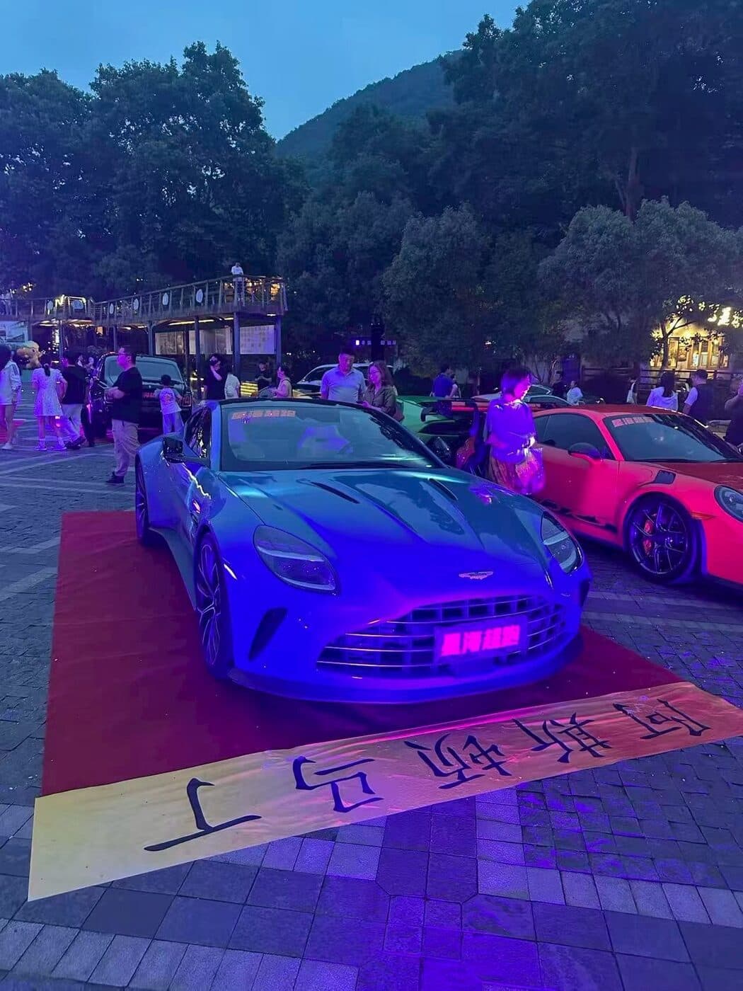 Blue Aston Martin at the supercar showcase