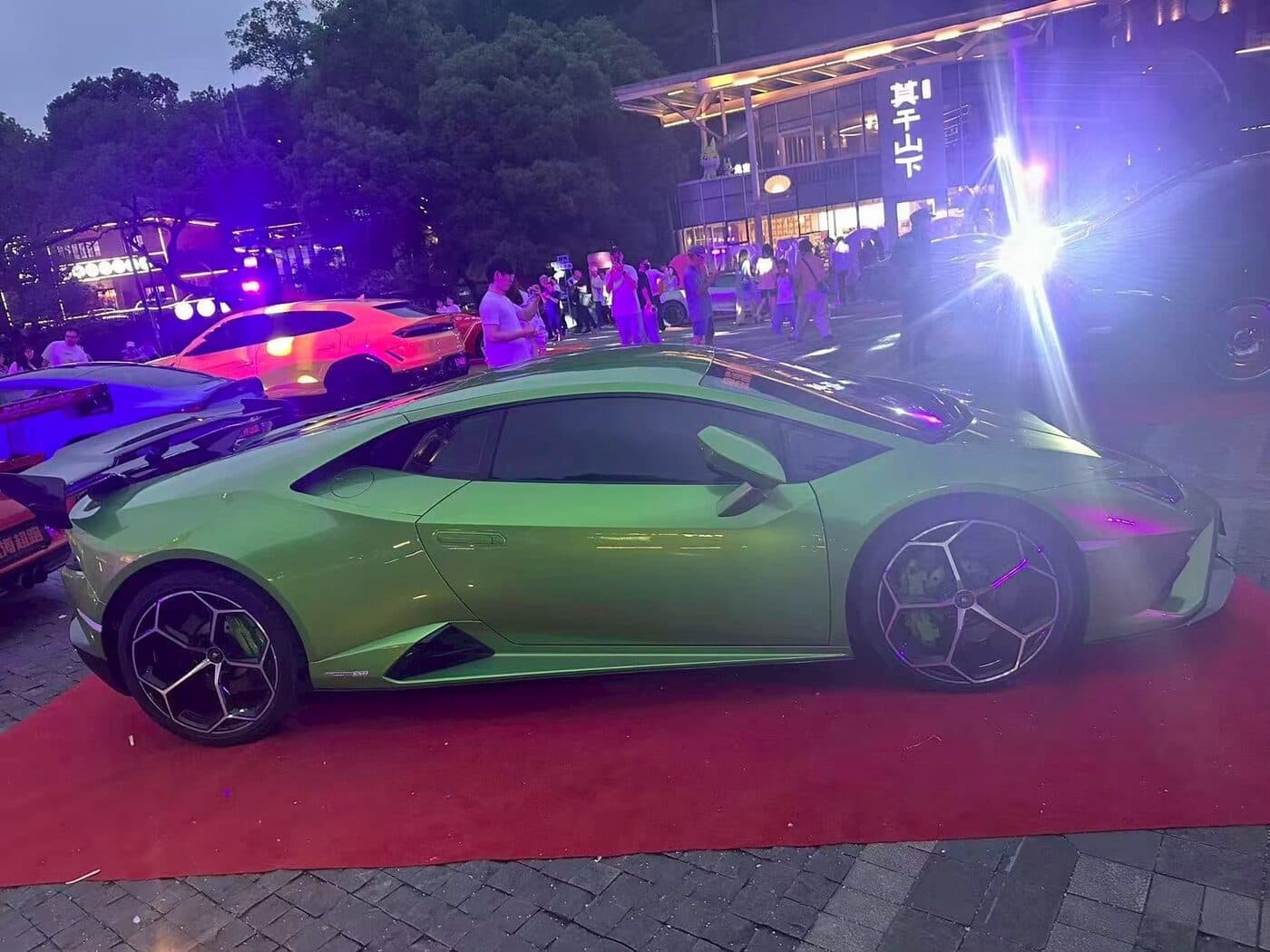 Green Lamborghini Huracán on the red carpet